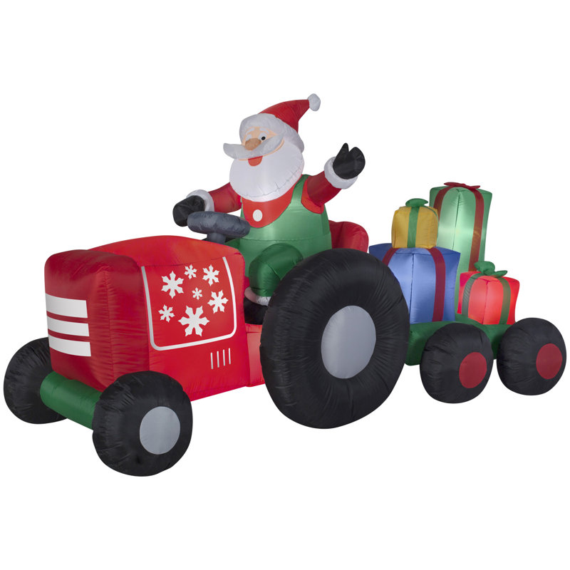 The Holiday Aisle Santa on Tractor with Presents Scene Inflatable